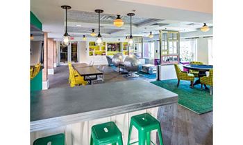 Resident clubhouse with TV lounge and kitchen